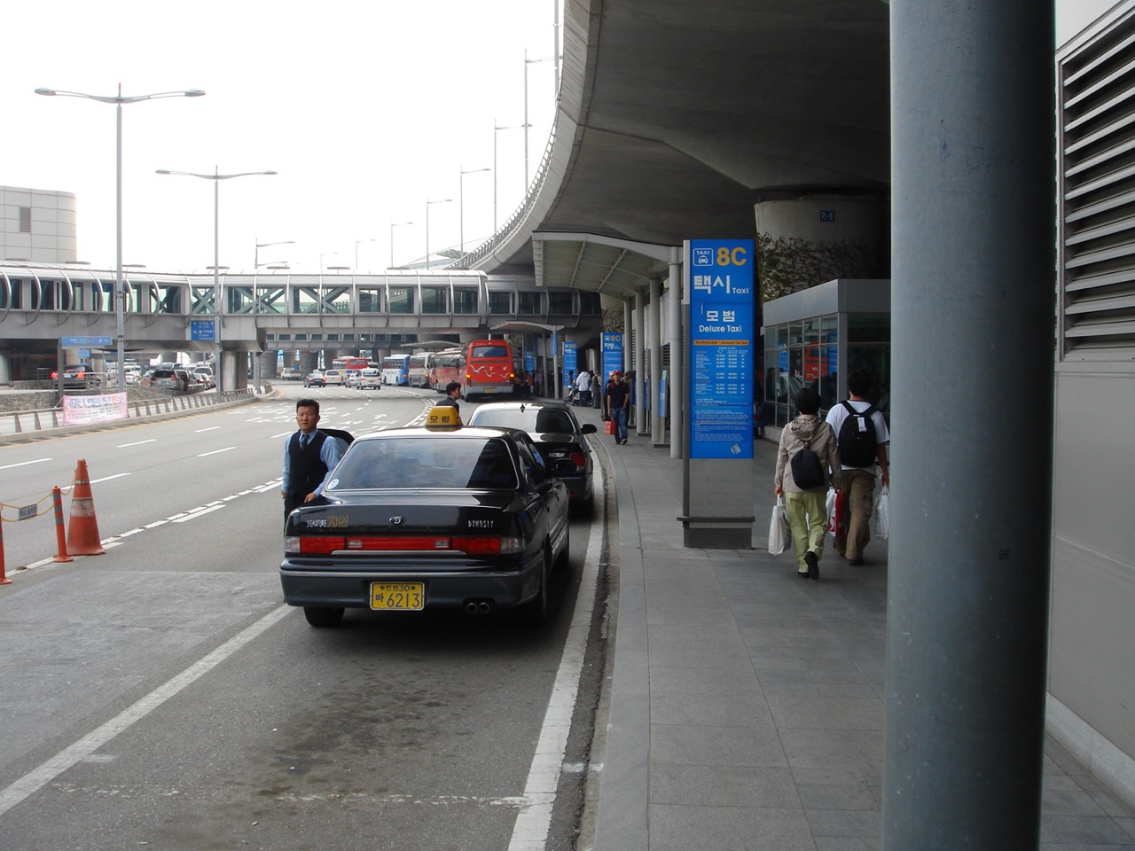 Official taxi and bus pickup lanes outside Incheon International Airport