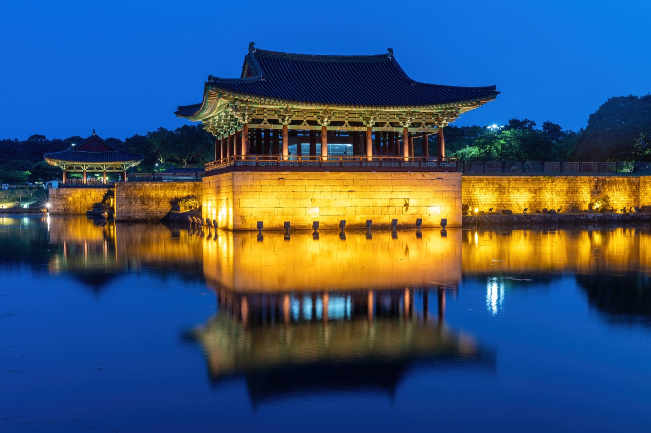Donggung Palace reflected in Wolji Pond during blue hour in Gyeongju