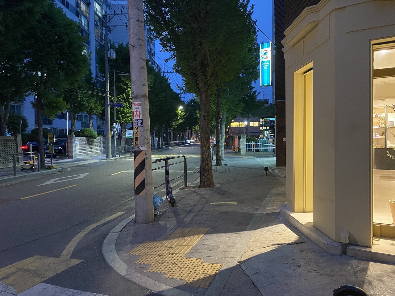 Evening street scene with shops in Seongsu-dong