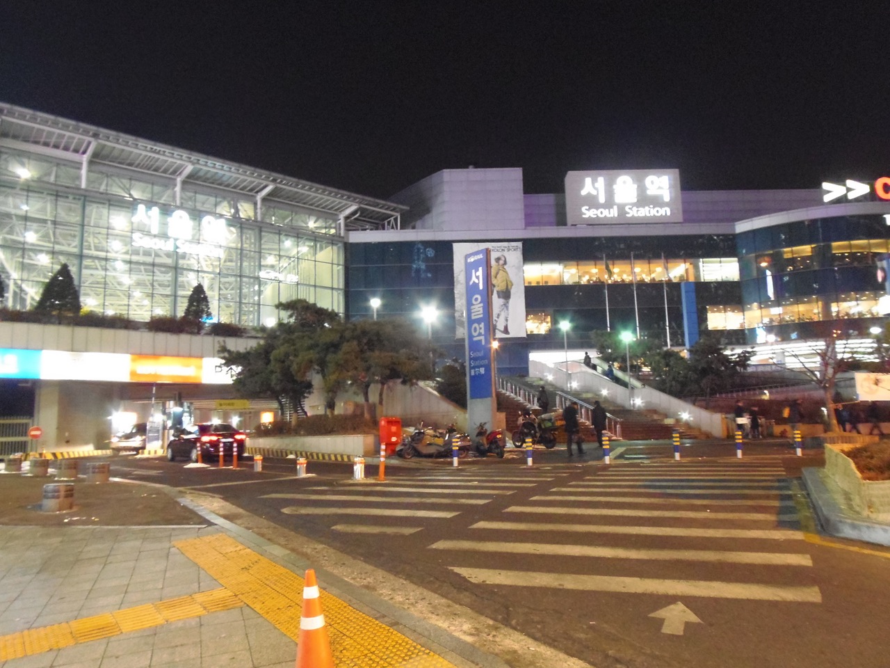 Seoul Station entrance and surrounding streets illuminated at night